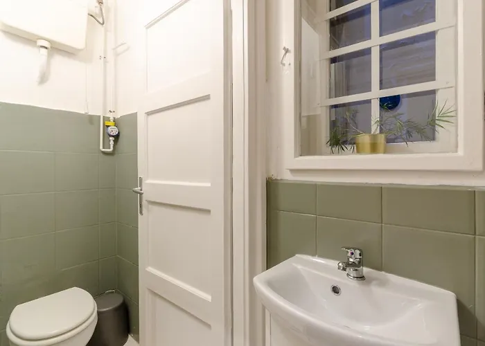 Apartament Cosy In District. *